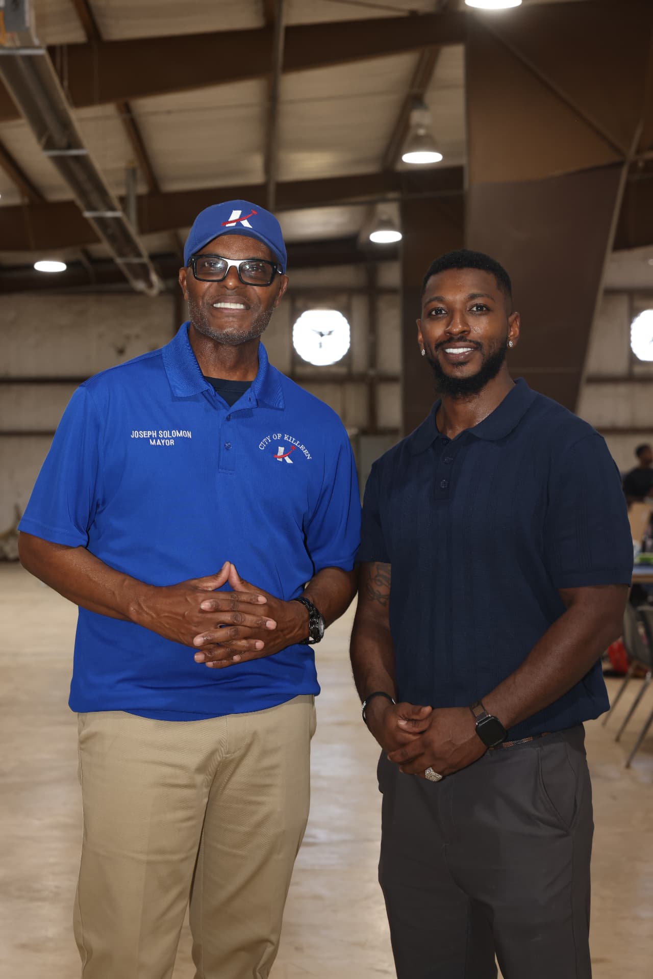 Mayor Joseph Solomon with the festival organizer inside the venue.