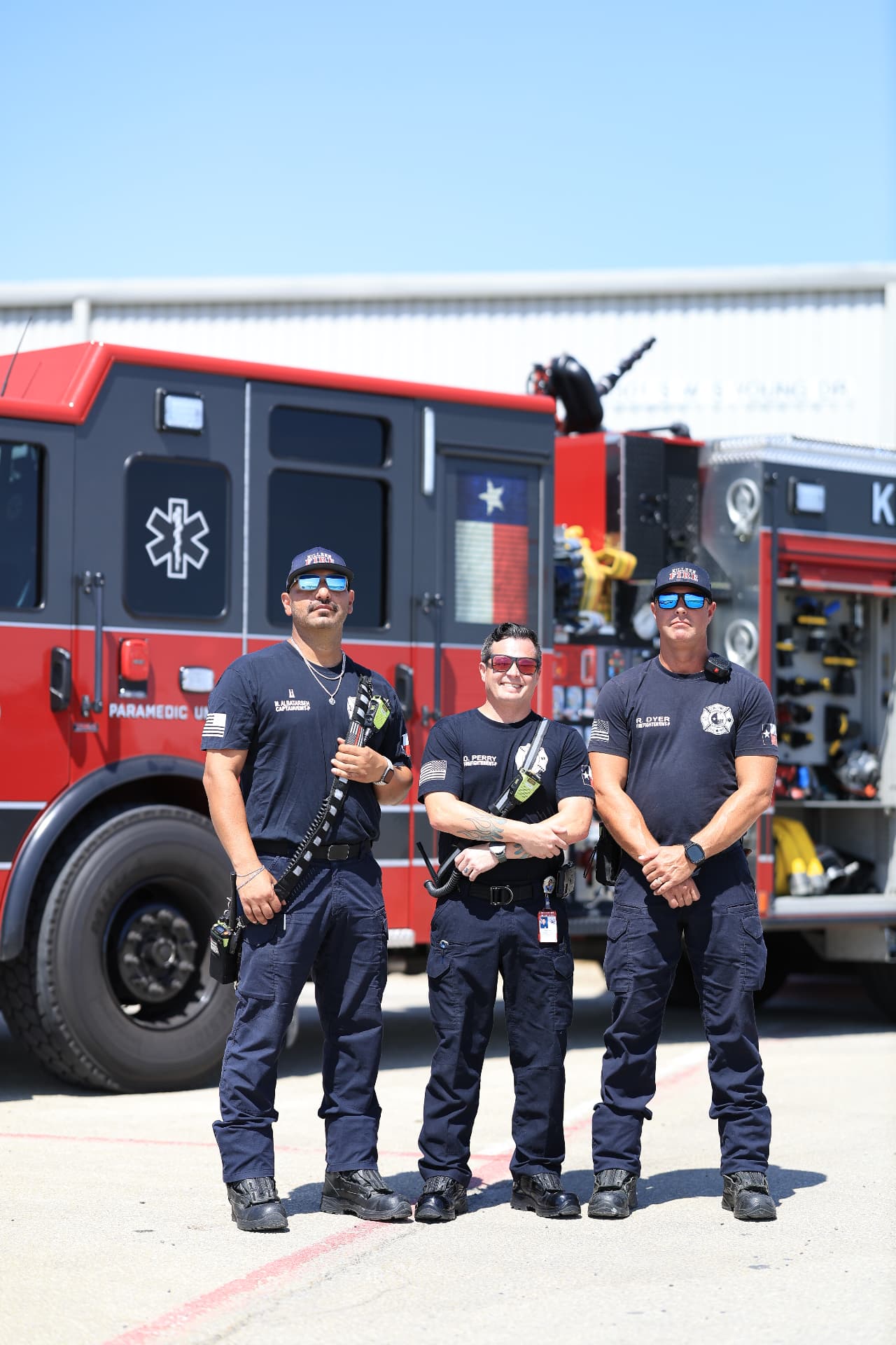 Killeen Fire-EMS crew standing in front of their engine outside the venue.