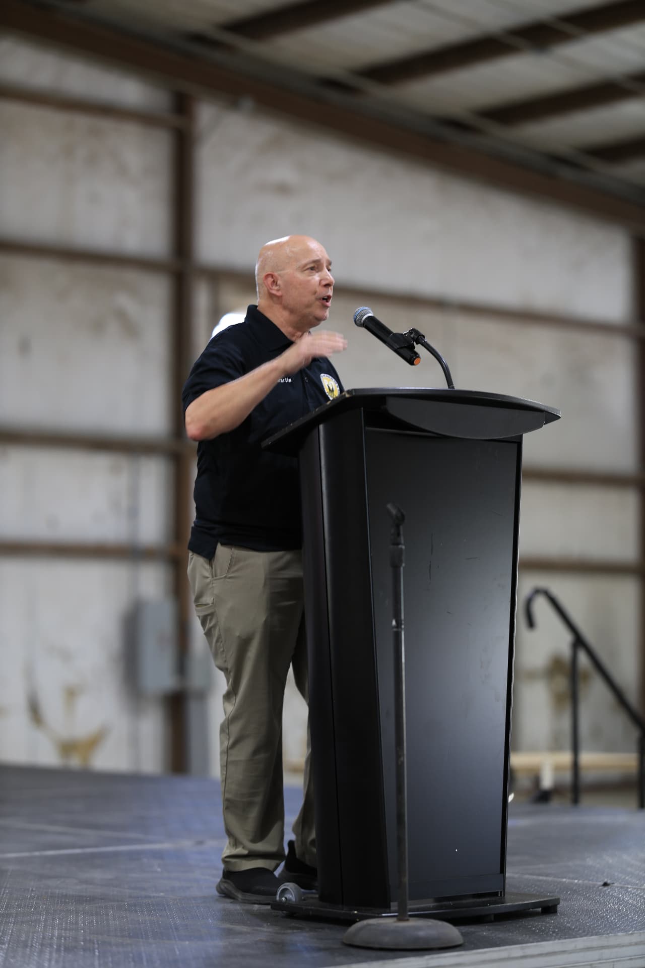 Martin Bonner of Army Community Service speaking from the podium.