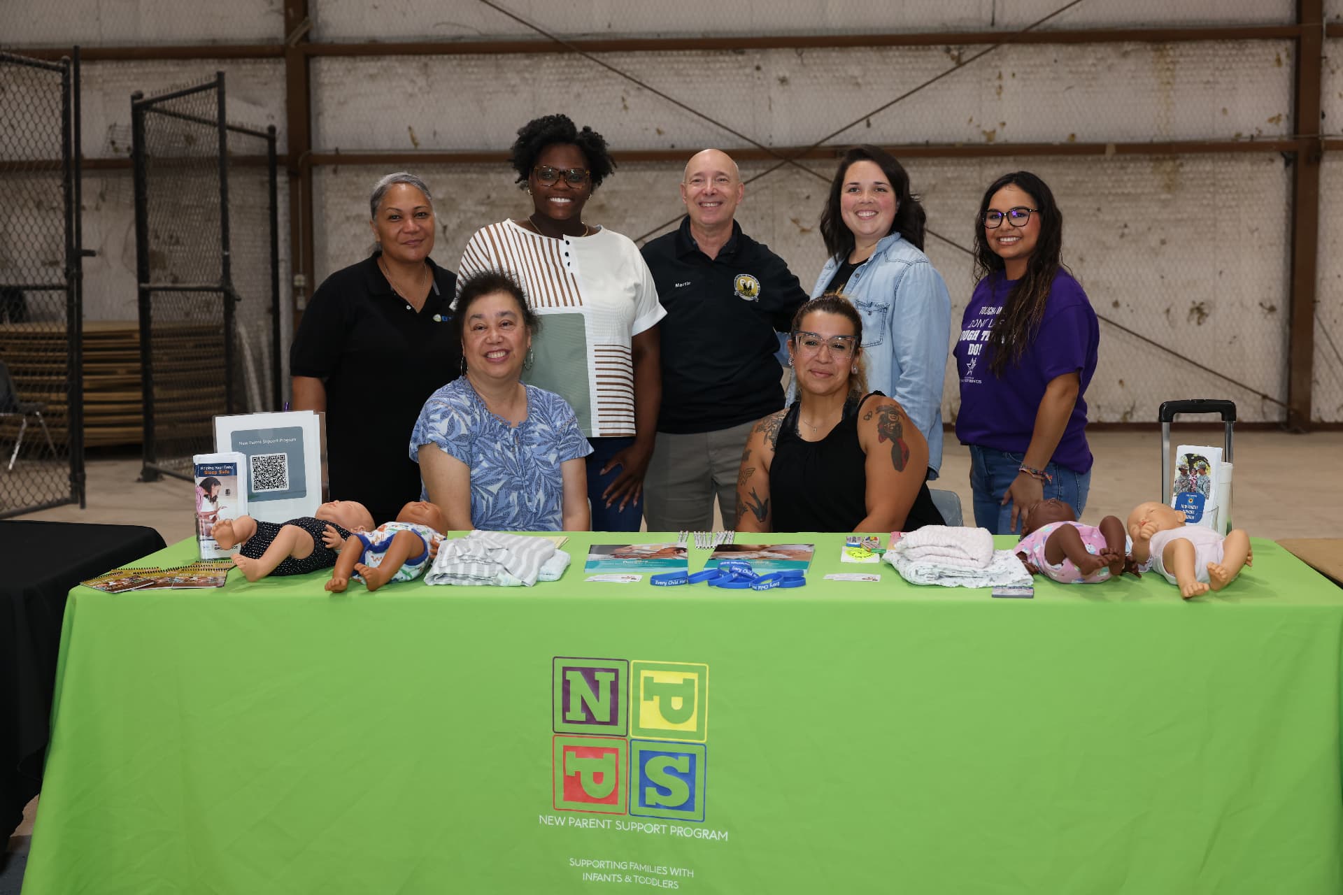 New Parent Support Program team at their resource table.
