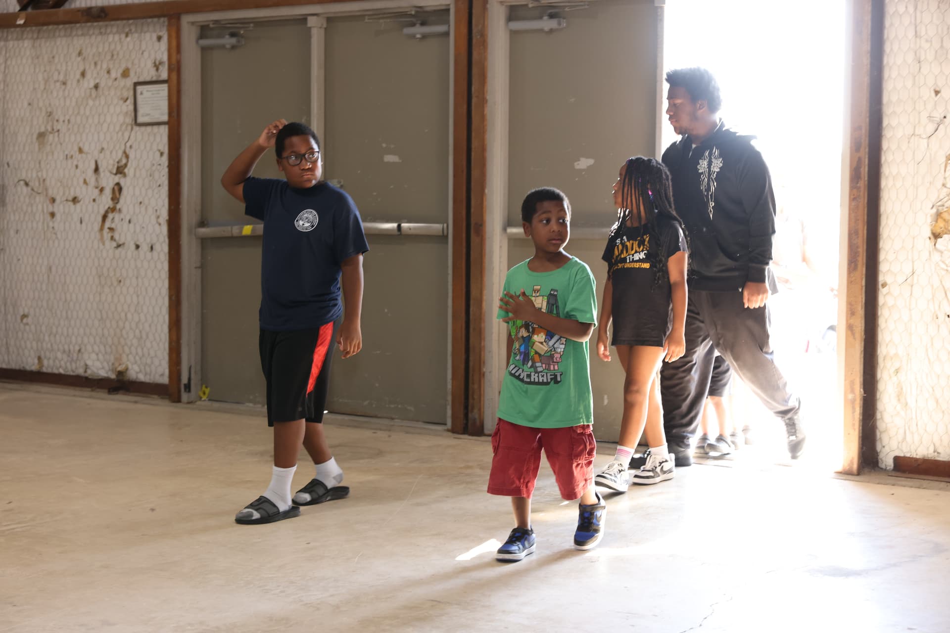 Kids walking into the venue as the festival gets underway.